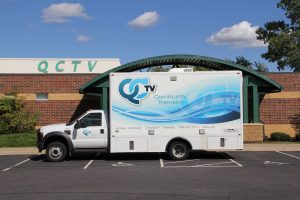 Truck and QCTV building